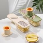 Mini Garlic Slicer: 3 in 1 Multi-Functional Mandoline Slicer, Garlic Ginger Grinder & Veggie Shredder with Container and Hand Guard - Image 3