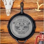 Lodge Pre-Seasoned Yellowstone Stamped Cast Iron Cookware - Signature Teardrop Handle - Use in the Oven, on the Stove, on the Grill, or Over a Campfire - 12 Inch Logo Skillet - Image 3