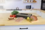 Nesco Preserve Plus Vacuum Sealer | Dry & Moist Modes | Built-in Bag Cutter & Roll Storage | 11.8" Seal Width | Includes 2 Rolls - Image 2